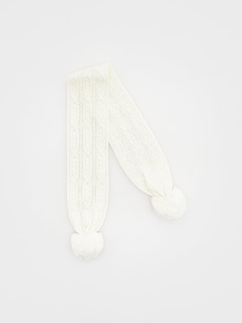White knitted scarf on a light gray background