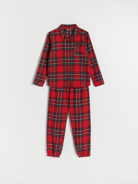 Red plaid pajama set on a white background
