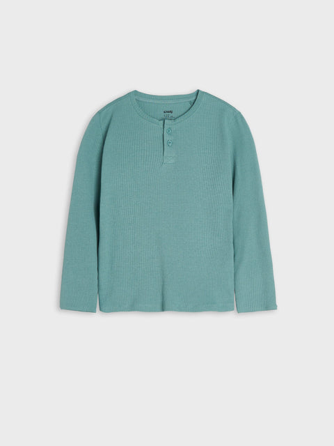 Green long-sleeve shirt on a light gray background