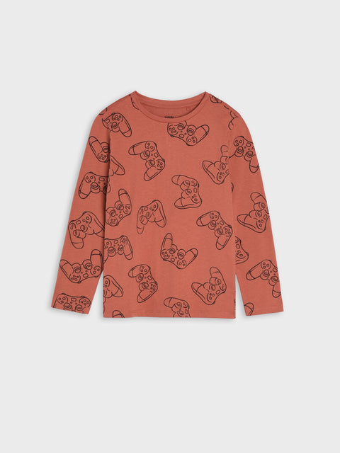 Red long-sleeve shirt with joystick pattern on a white background