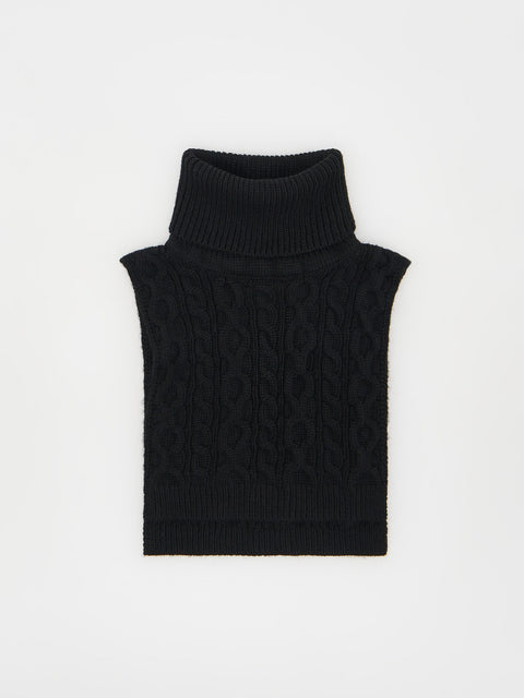 Black cable knit sleeveless sweater on a white background