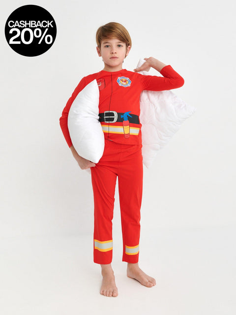 Child wearing a red superhero costume with a white cape on a light gray background