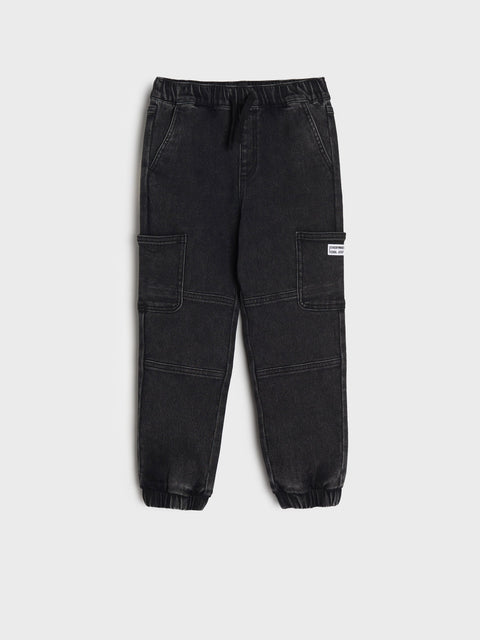 Black cargo pants on a white background