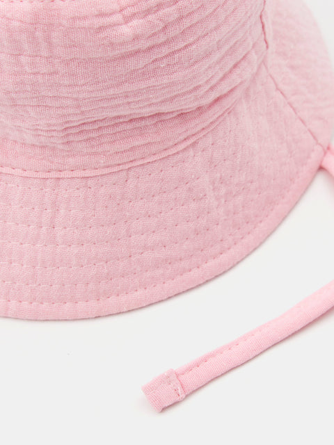 Pink bucket hat on a white background