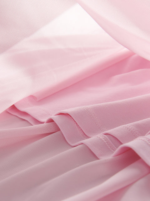 Close-up of pink fabric with a focus on texture and color.