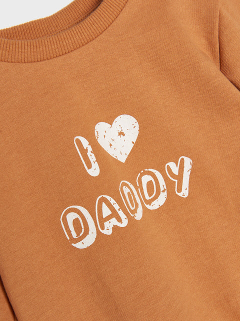 Brown sweatshirt with 'I ❤️ DADDY' text on a plain background