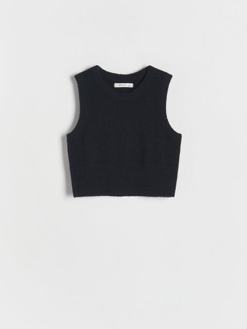 Black sleeveless top on a light gray background