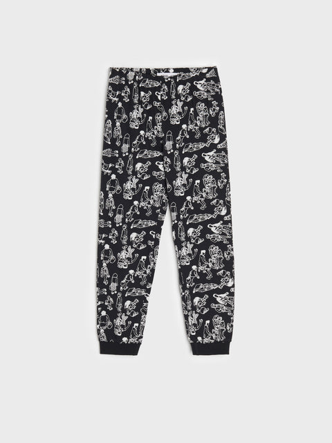 Black pants with white graphic design on a white background