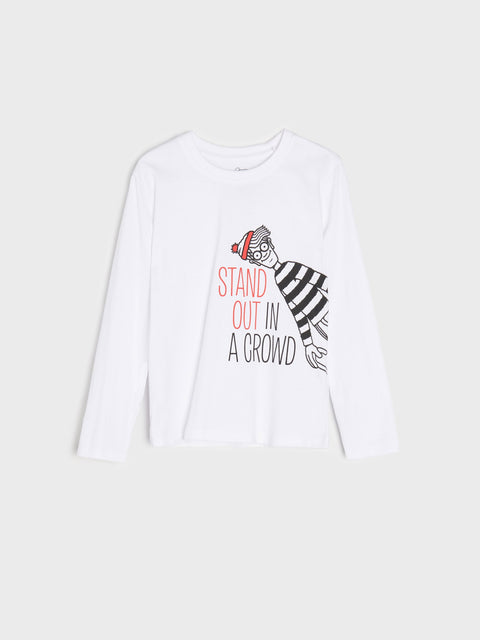 White long-sleeve shirt with a graphic of a person wearing a hat and striped pants, and text 'Stand Out in a Crowd' on a white background.