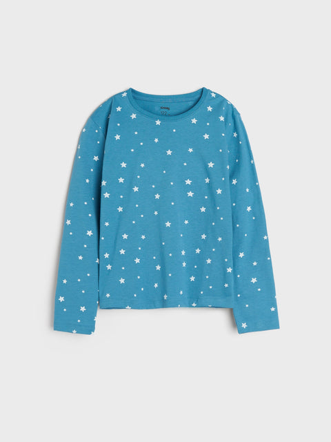Blue long-sleeve shirt with white star pattern on a light gray background