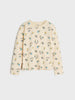 Beige sweater with floral pattern on a white background