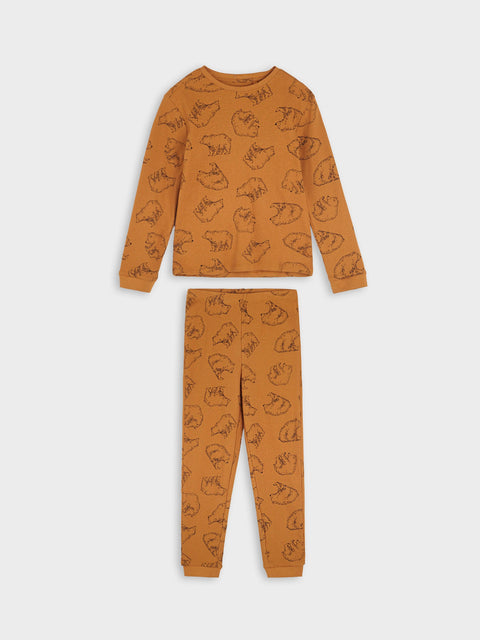 Children's pajama set with animal pattern on a white background