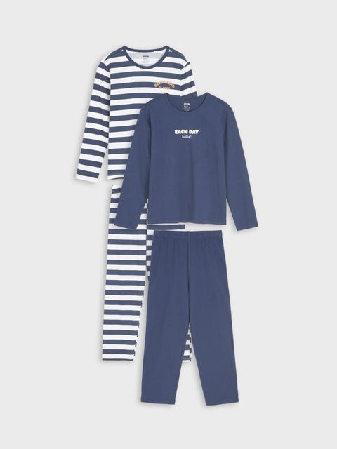Children's navy and white striped pajama set on a light gray background