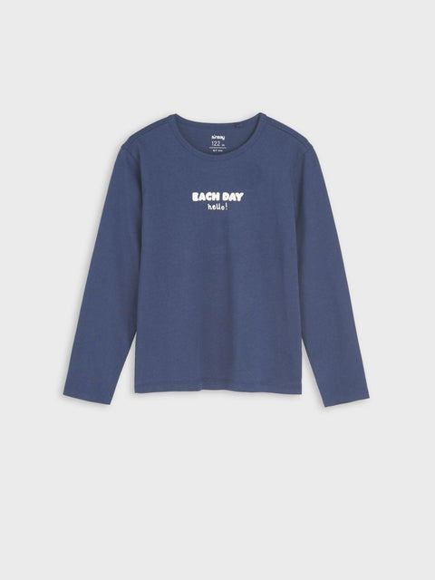 Blue long-sleeve shirt with text on a light gray background