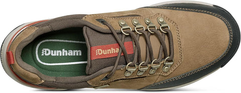 Brown hiking shoe with Dunham branding on a white background
