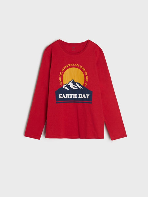 Red long-sleeve shirt with Earth Day graphic on a white background