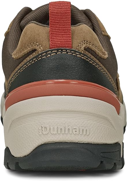 Brown and red shoe with 'Dunham' branding on a white background