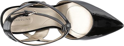 Black high-heeled shoes with a clear heel and white sole on a black background