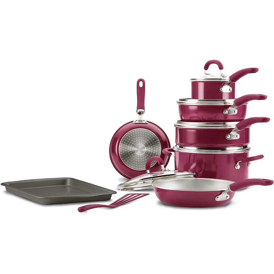 A 10-piece cookware set in a deep magenta color, featuring nested pots and pans with matching lids, a frying pan, a rectangular baking sheet, a spatula, and a whisk, all displayed on a clean white background.