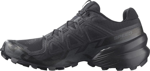Black running shoe with 'Speed' branding on a white background