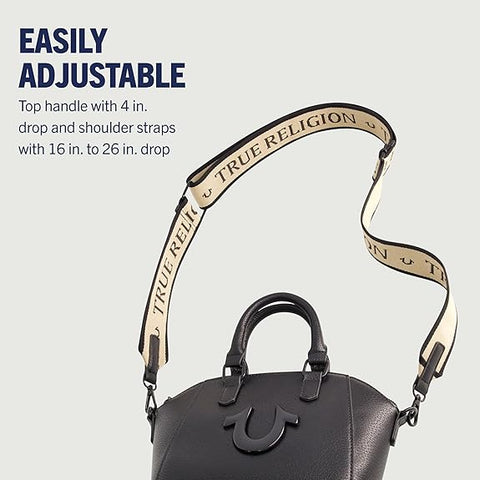 Black handbag with adjustable True Religion strap on a light gray background