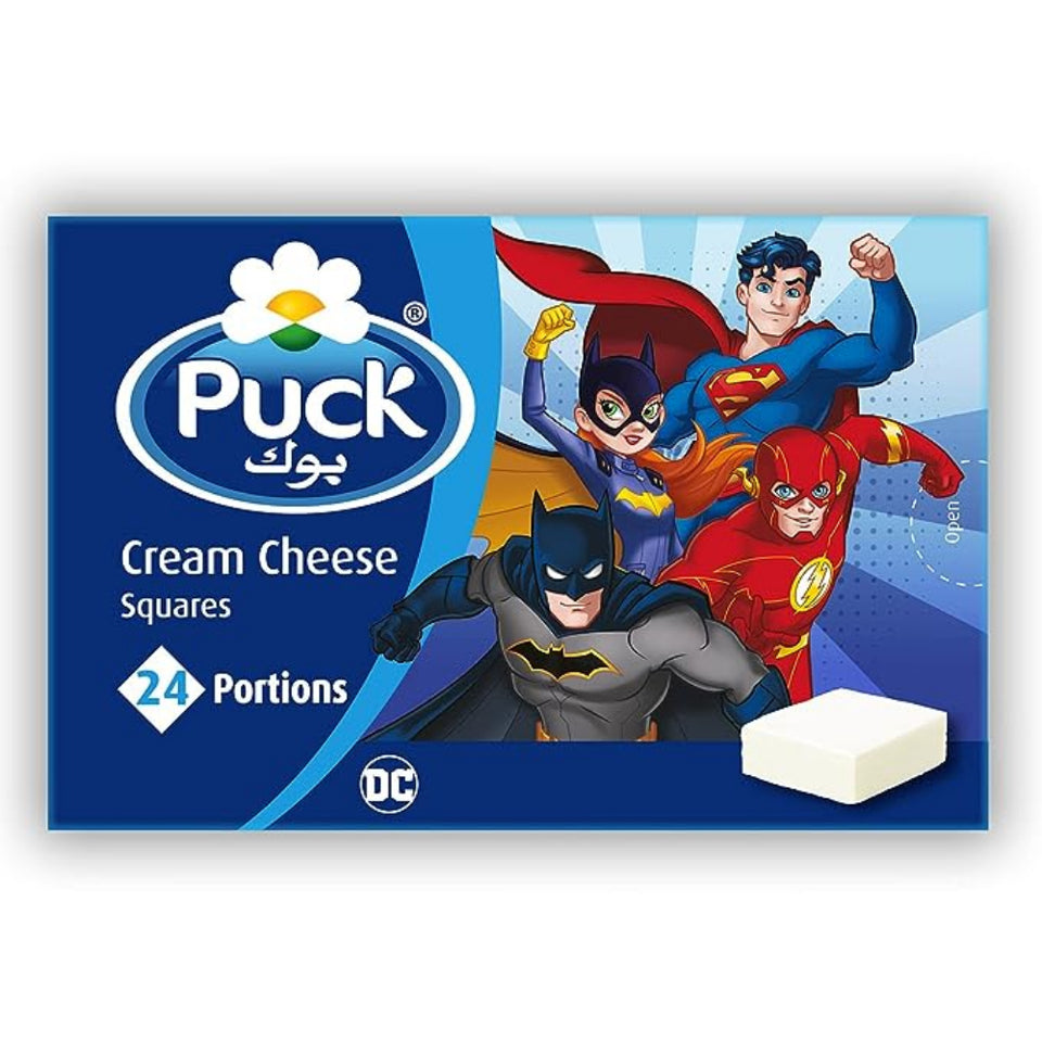 Packaging of Puck Cream Cheese Squares featuring superhero characters. The package has 24 portions and displays the DC logo.