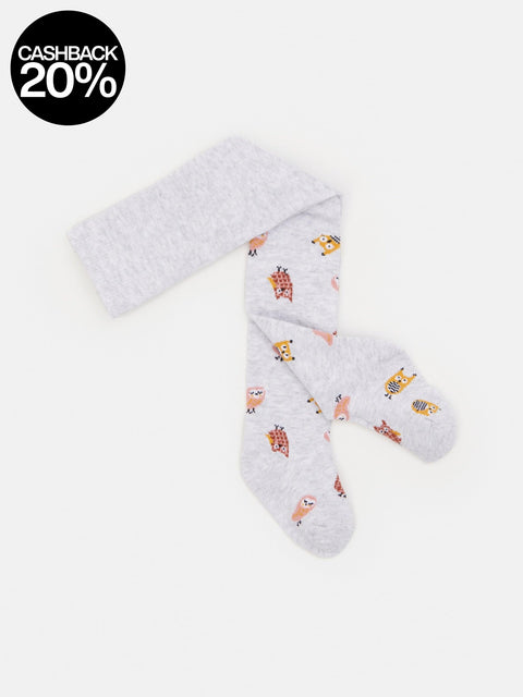 White socks with small colorful patterns on a light gray background