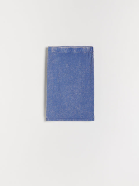 Blue denim fabric on a white background