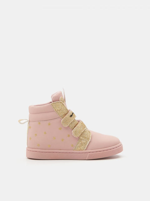 Pink high-top sneaker with gold polka dots on a white background
