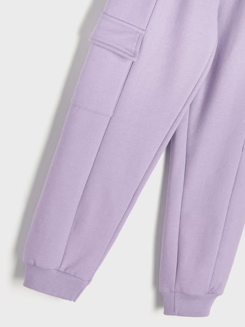Close-up of a light purple sweatshirt on a white background