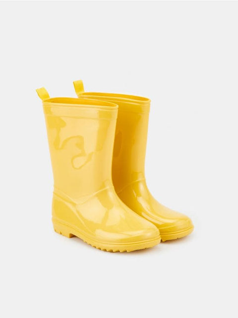 Pair of yellow rain boots on a white background