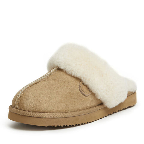Beige slipper with white fur lining on a white background