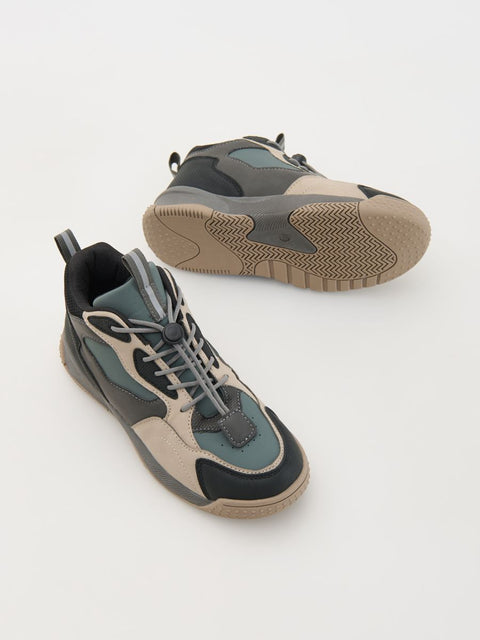 Pair of multi-colored sneakers on a white background