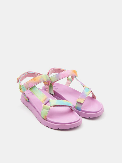 Pink sandals with multicolor straps on a white background