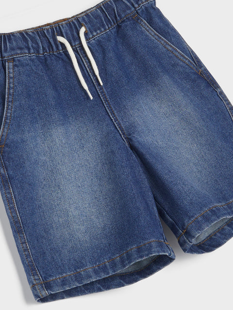 Blue denim shorts with a drawstring on a light gray background