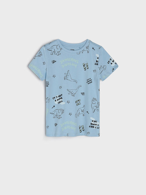 Blue t-shirt with dinosaur prints on a white background