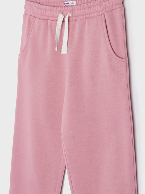 Pink sweatpants with a drawstring on a white background