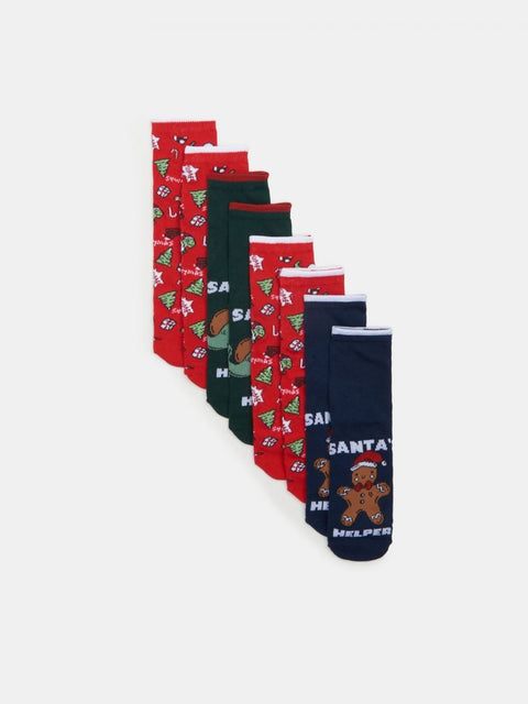 Set of Christmas-themed socks with various designs on a white background