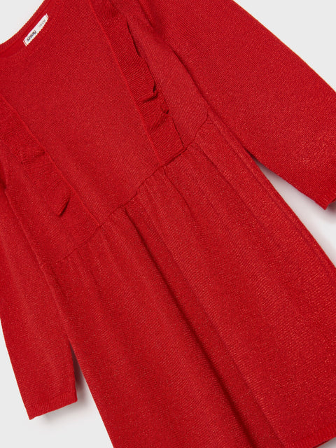 Red dress with ruffled details on a white background