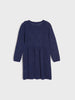 Blue dress on a light gray background