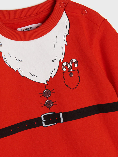 Red children's outfit with Santa Claus design on a white background