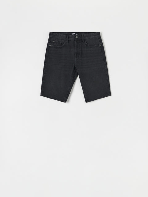 Black denim shorts on a white background