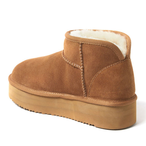 Brown suede boot with white fur lining on a white background