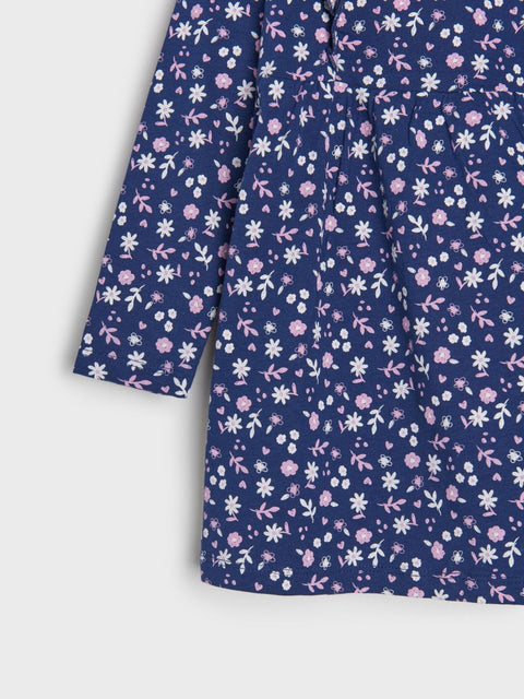 Navy blue dress with small floral pattern on a white background