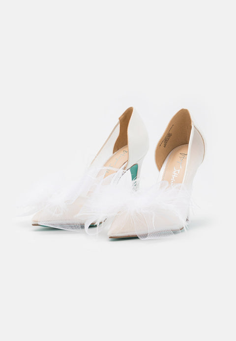 White high-heeled shoes on a white background