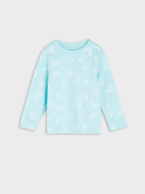 Light blue long-sleeve shirt with a pattern on a white background