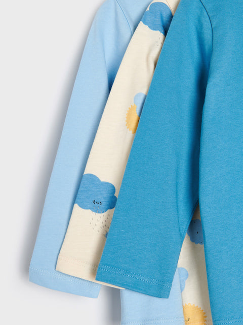 Children's clothing with cloud pattern on a light gray background