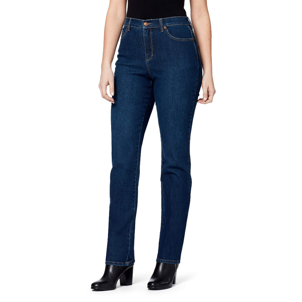 Person wearing dark blue jeans on a white background