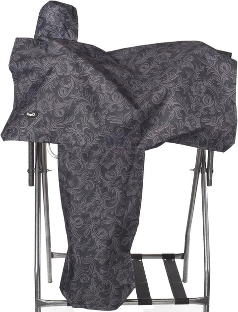 Black and gray patterned saddle blanket on a metal stand