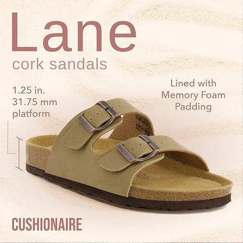 Green cork sandal with platform and memory foam padding on a beige background